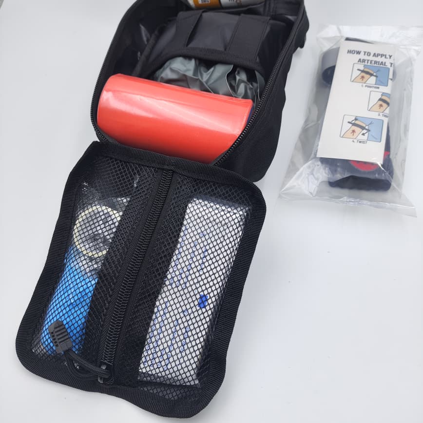 Portable first aid pouch with organized storage compartments, support supplies and emergency response accessories.